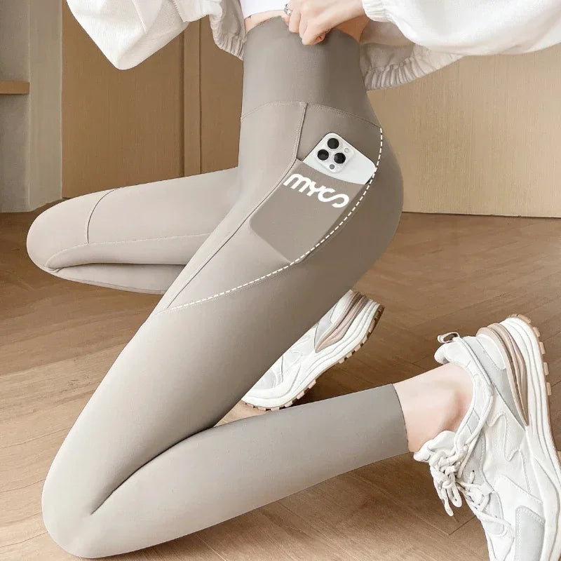 Pantalones de Yoga sin costuras con bolsillo